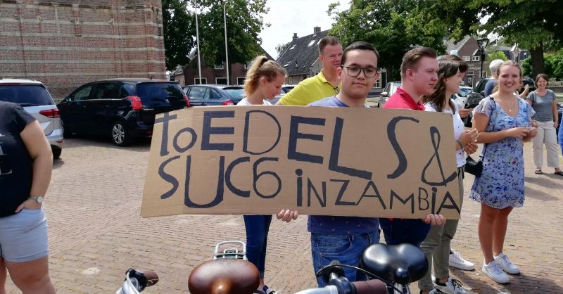 Inclusief spandoek