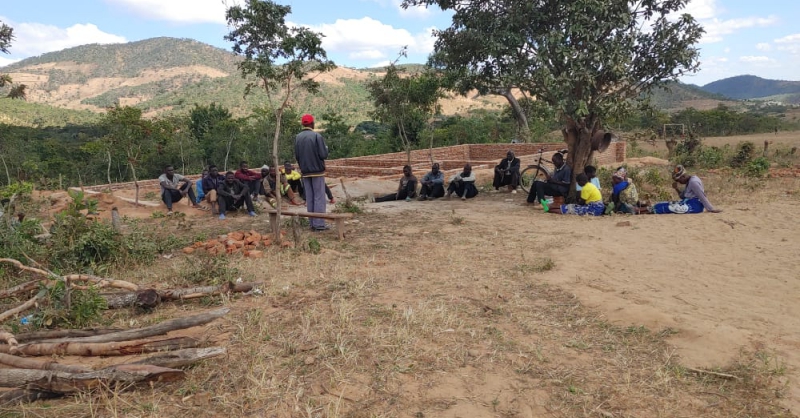 Community members listens attentively to the Forest officer