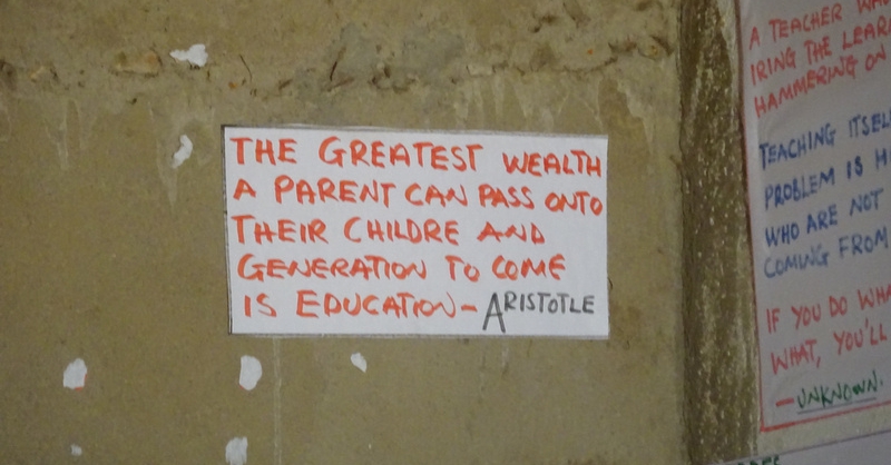 Poster in kantoor van de hoofdmeester