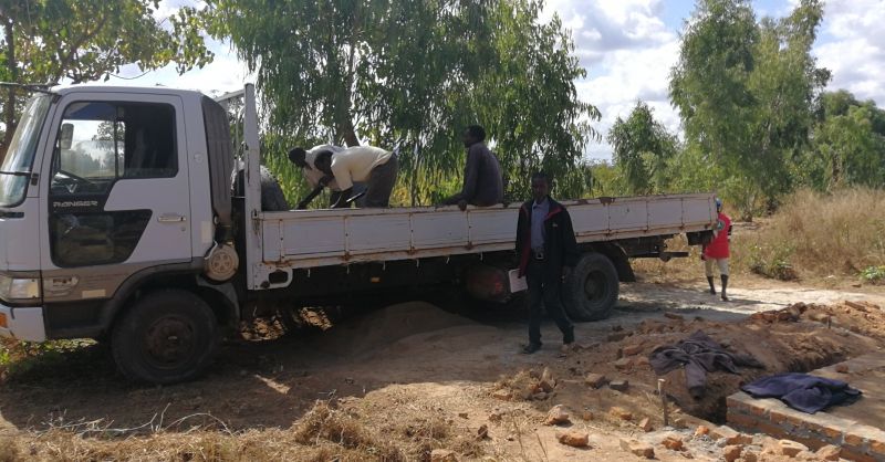 Truck being unloaded