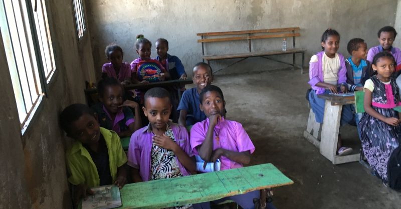 Children enjoying the well ventilated classroom