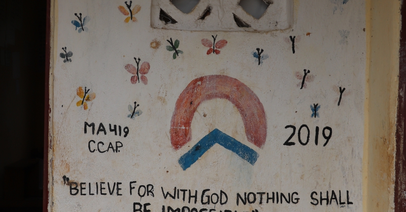 World servants logo on the school block
