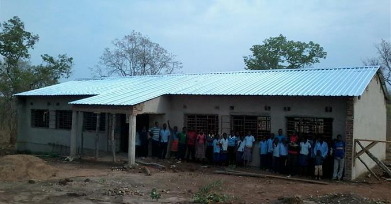 Community in front of school