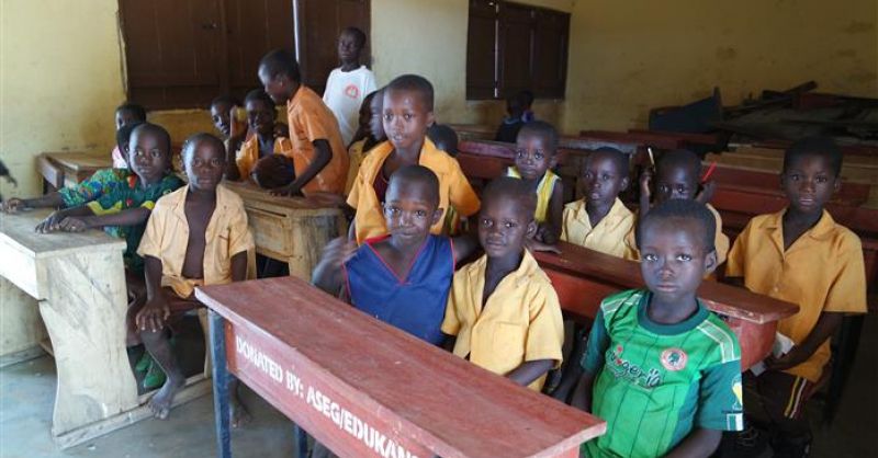 Children in classroom with furniture