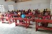 Children sitting on the desks