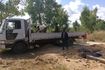 Truck being unloaded