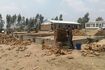 Overview of the building site in front of existing school