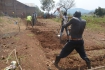 Community members digging foundation