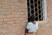 A learner trying to watch visitors in the meeting room